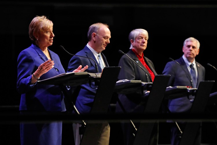 Maine's candidates for governor, seen at a debate Oct. 17 in Augusta, were back at it Thursday night, just 12 days before the election. From left are Democrat Janet Mills, independents Alan Caron and Terry Hayes, and Republican Shawn Moody.