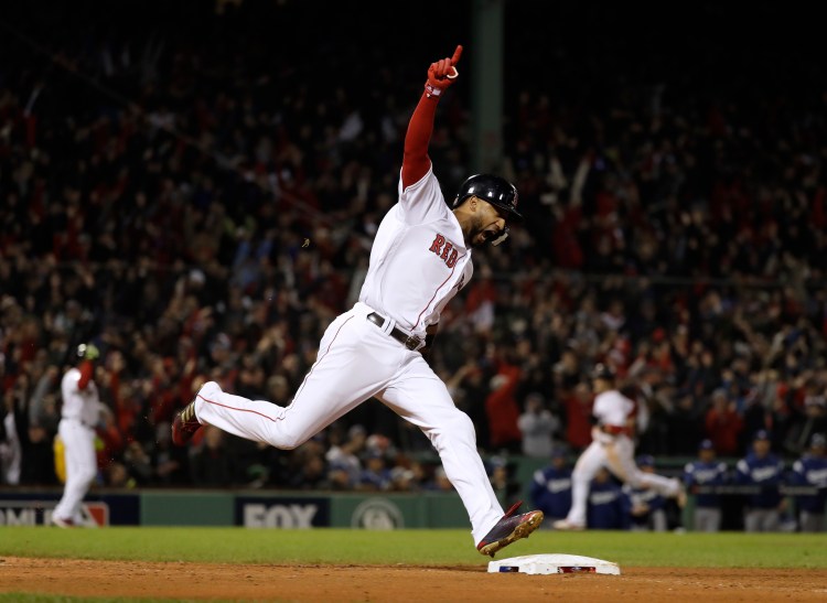 Boston's Eduardo Nunez celebrates his pinch-hit, three-run home run that blew open Game 1 of the World Series in the eighth inning.