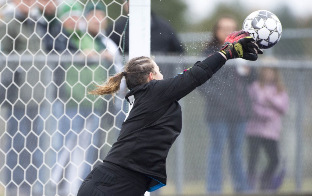Fort Kent goalie Lyndsay Ouellette makes a save against Maranacook in the Class C girls state championship game Saturday at Hampden Academy.
