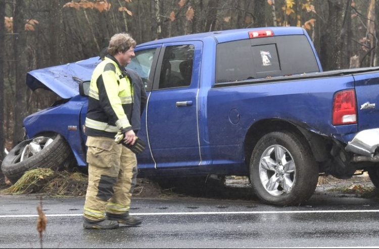Waterville firefighters investigate a serious accident that occurred on the southbound lane of Interstate 95 in Waterville. Traffic was backed up 3 miles on Tuesday.