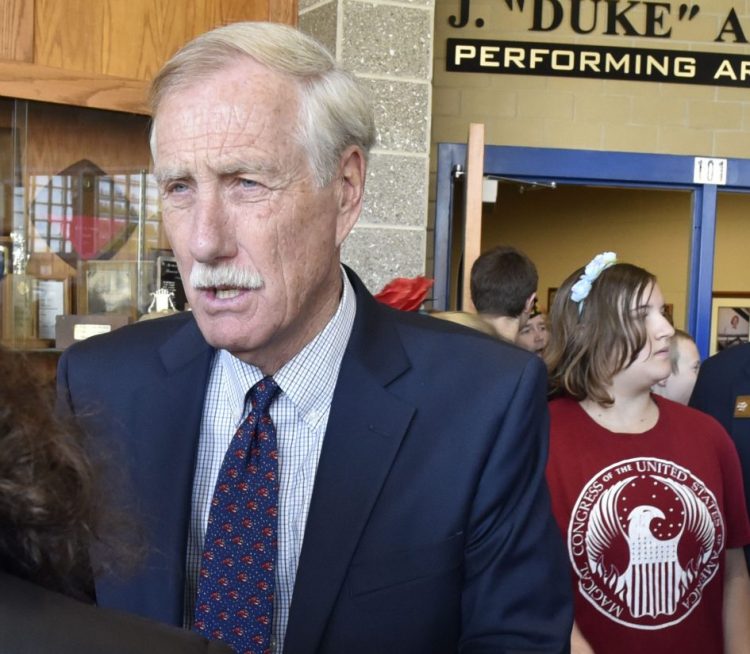 U.S. Sen. Angus King, I-Maine, speaks with reporters Thursday after a Messalonskee Middle School Veterans Day assembly at Messalonskee High School in Oakland.