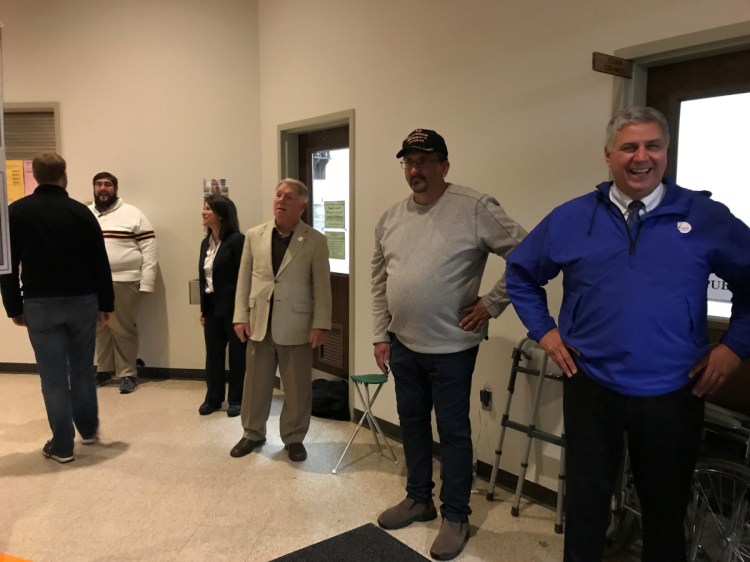 Republican Sen. Scott Cyrway, right, at the Fairfield Community Center on Election Day, edged out Democrat Karen Kusiak by 165 votes in the Senate District 16 election. As of Thursday, Kusiak had not decided whether to ask for a recount.