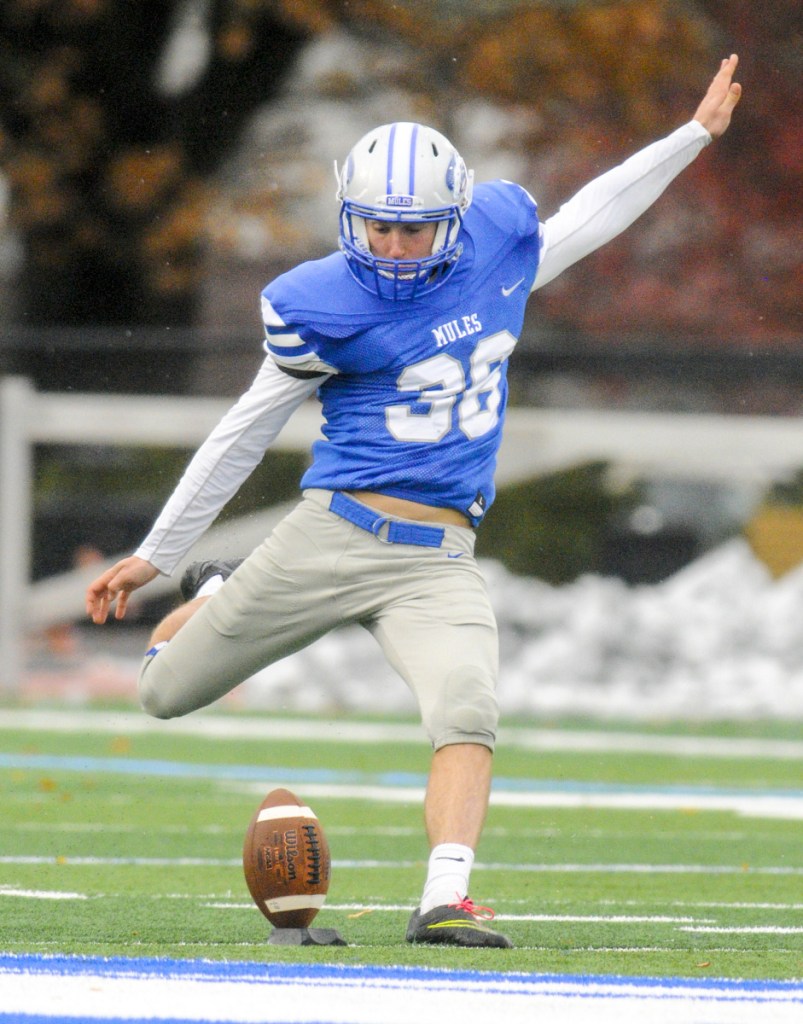 Colby kicker Walter Thilly kicks off against Bowdoin on Saturday in Waterville.