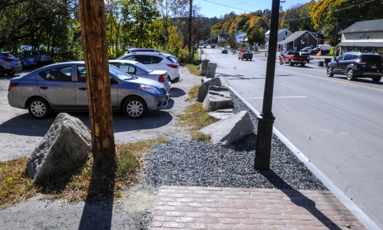 The new sidewalk ends at the Lucky Garden restaurant parking lot, as seen on Oct. 22 on Water Street in downtown Hallowell.