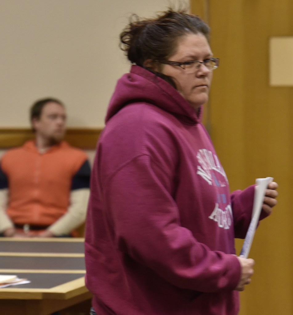Defendant Jaime Danforth returns to her seat Wednesday during a hearing in Somerset County District Court in Skowhegan. Danforth has been charged with animal trespass after her Holstein cow wandered to a neighbor's property, where it was shot. The case may go to trial next spring.