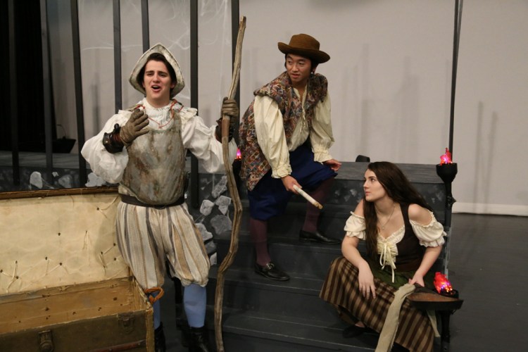 The Skowhegan Area High School theater group will present "Man of La Mancha" Thursday, Friday and Saturday. Players, from left, are Taylor Kruse as Don Quixote, Kyle Lee as Sancho Panza and Emma York as Aldonza.