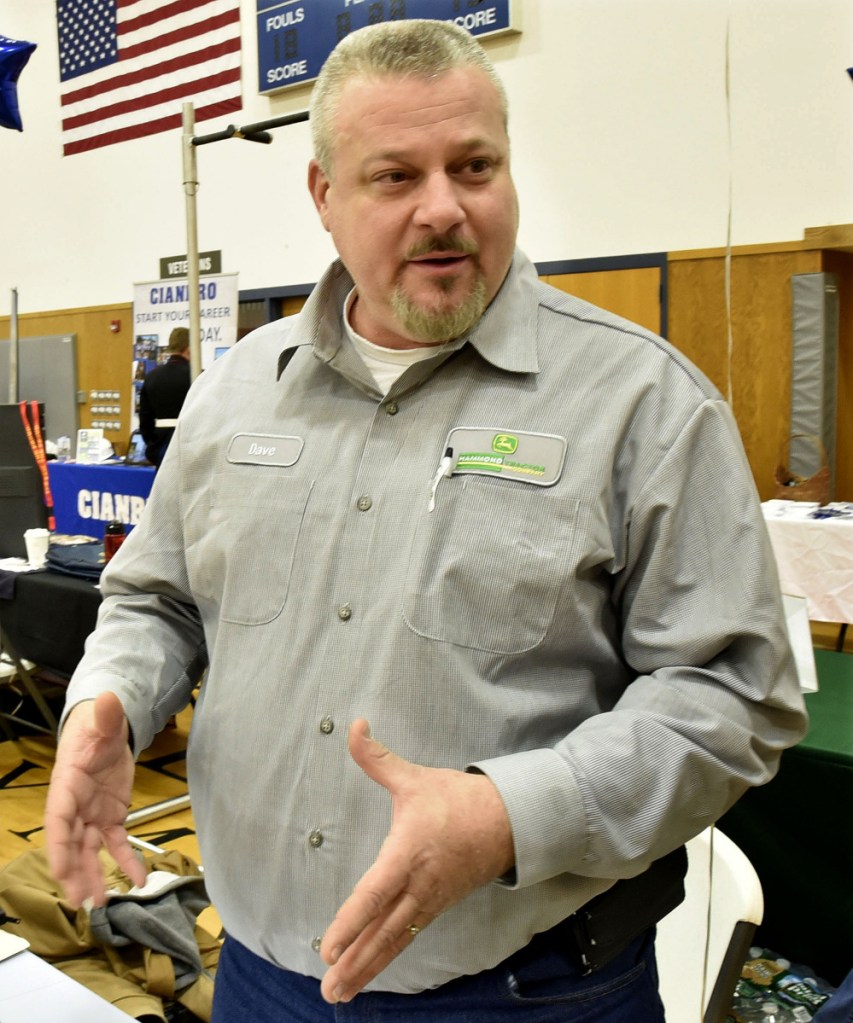 David Ponsant, of Hammond Tractor, was one of the job recruiters Thursday at a job fair held at Kennebec Valley Community College's Hinckley campus.