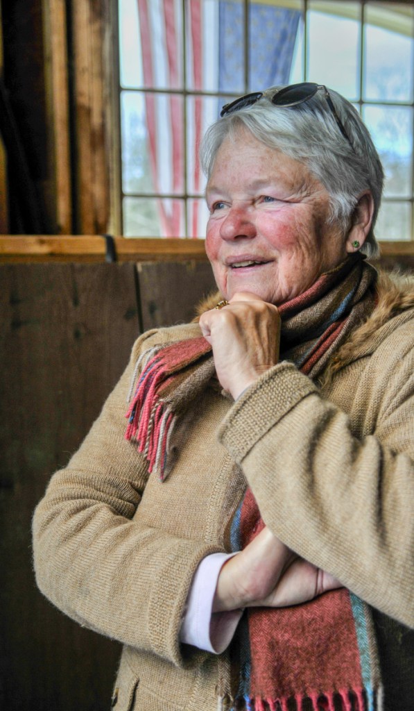 Judy Abbott poses for a portrait in the barn on Saturday at Foggy Moon Farm in West Gardiner.