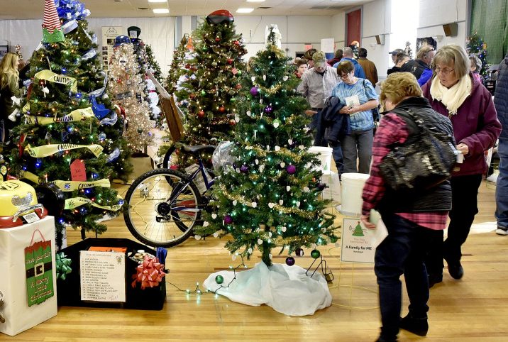 People in the holiday spirit filled the former American Legion hall in Waterville the last two weekends to decide which trees and gifts to take a chance on during the fourth annual Sukeforth Family Festival of Trees event held at the former American Legion Hall in Waterville. Decorated trees and gifts from 72 vendors were offered, and the proceeds go to Hospice Volunteers of Waterville Area, Spectrum Generations Meals on Wheels and Maine Children's Home for Little Wanderers.