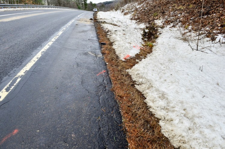 Orange paint marks an accident scene Thursday on Route 3 east of Lake St. George  State Park in Liberty.