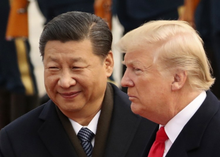 President Trump and Chinese President Xi Jinping participate in a welcome ceremony at the Great Hall of the People in Beijing about one year ago.