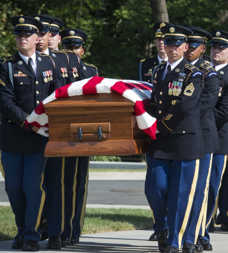 Members of the 3rd Infantry Regiment carry the remains of two unknown Civil War soldiers to their grave at Arlington National Cemetery on Sept. 6.