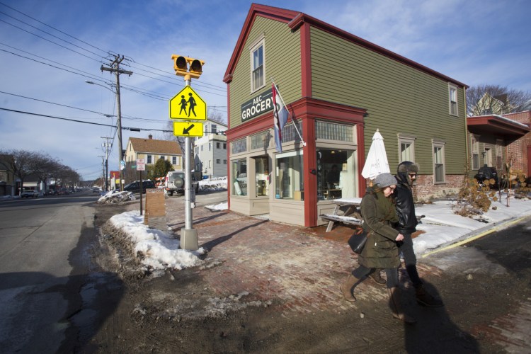 Businesses along Washington Avenue, including A&C Grocery, have been affected by water and sewer line work that has torn up the road and sidewalk in front of the stores. Owner Joe Fournier: "It's gone from an industrial corridor to a very cool and dynamic row of interesting, locally owned businesses."