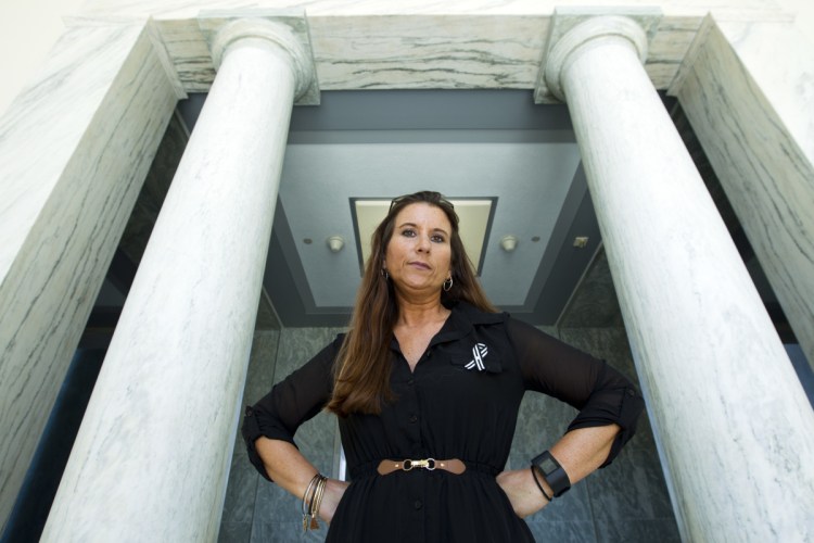 Jamee Cook, shown in September, blames her breast implants for causing her medical problems that stopped once she had the implants removed. She now lobbies the FDA and congressional leaders to do a better job of tracking and regulating medical devices.
