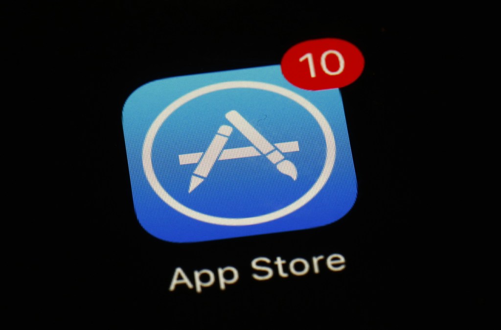FILE - This March 19, 2018, file photo shows Apple's App Store app in Baltimore. Apple is at the Supreme Court to defend the way it sells apps for iPhones against claims by consumers that the company has unfairly monopolized the market. The justices are hearing arguments Monday, Nov. 26, in Apple's effort to end an antitrust lawsuit that could force the iPhone maker to cut the 30 percent commission it charges software developers whose apps are sold exclusively through Apple's App Store. (AP Photo/Patrick Semansky, File)
