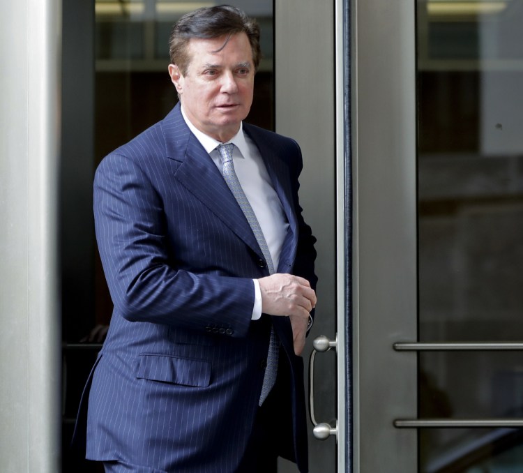 Paul Manafort, President Trump's former campaign chairman, leaves the federal courthouse in Washington. 