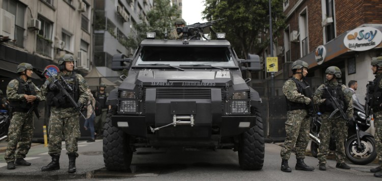 Border police block a street in Buenos Aires, Argentina. Thousands of police and security agents will guard the Group of 20 industrialized nations' world leaders during the two-day summit.