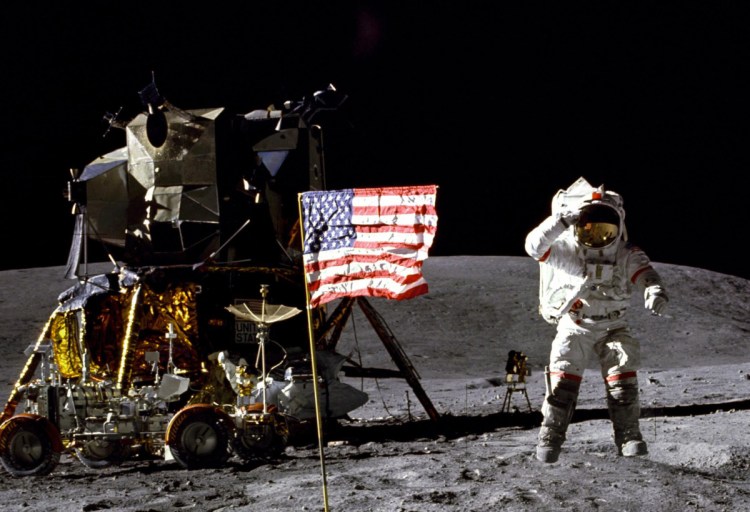 American astronaut John Young salutes the U.S. flag at the Descartes landing site on the moon during the first Apollo 16 extravehicular activity in April 1972.