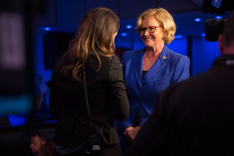 U.S. Rep. Chellie Pingree speaks with a news reporter at the Maine Democrats' election night party for gubernatorial candidate Janet Mills and Pingree at Aura in Portland on Tuesday.
