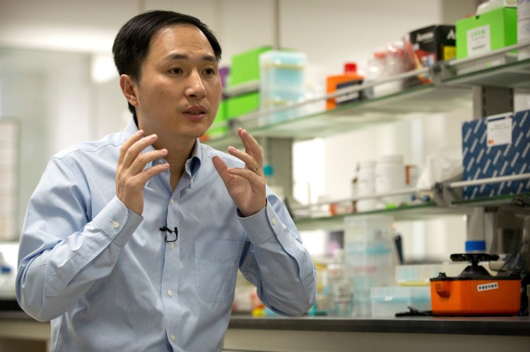 In this Oct. 10, 2018 photo, He Jiankui speaks during an interview at a laboratory in Shenzhen in southern China's Guangdong province. Chinese scientist He claims he helped make world's first genetically edited babies: twin girls whose DNA he said he altered. He revealed it Monday, Nov. 26, in Hong Kong to one of the organizers of an international conference on gene editing. 