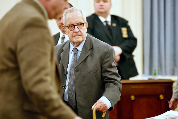 Former priest Ronald Paquin enters the courtroom at York County Superior Court to stand trial in Maine for sexual misconduct. 