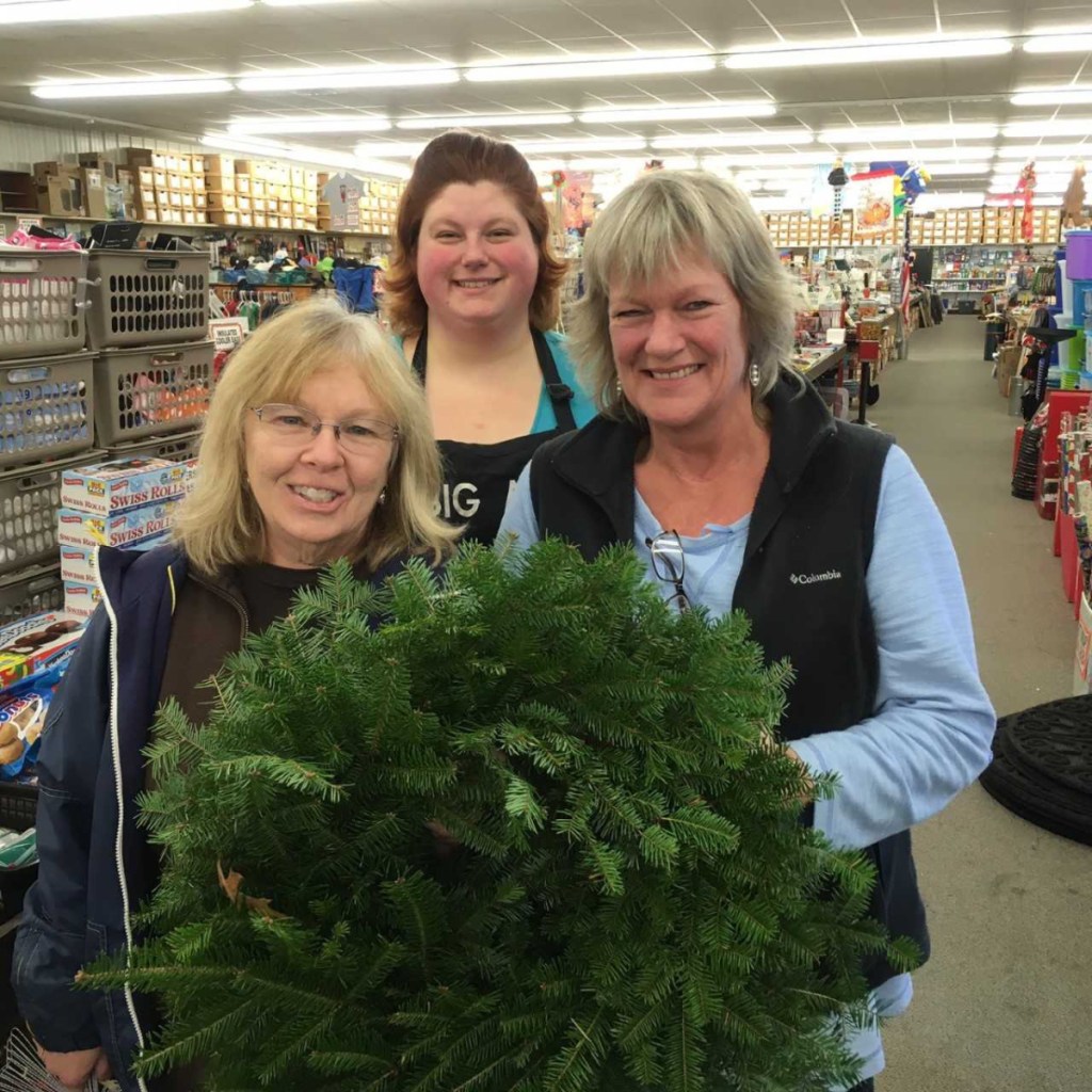 The Big Al's crew of Melissa Cohen, left, with Rose Baile, and Marian Cromwell, received an empty wreath to  decorate for display at Wiscasset Holiday Marketfest. Nine additional Wiscasset Area Chamber of Commerce business members are decorating wreaths for the event. Wreaths will be donated to local families after Marketfest which runs from Thursday through Sunday, Dec. 6-9.