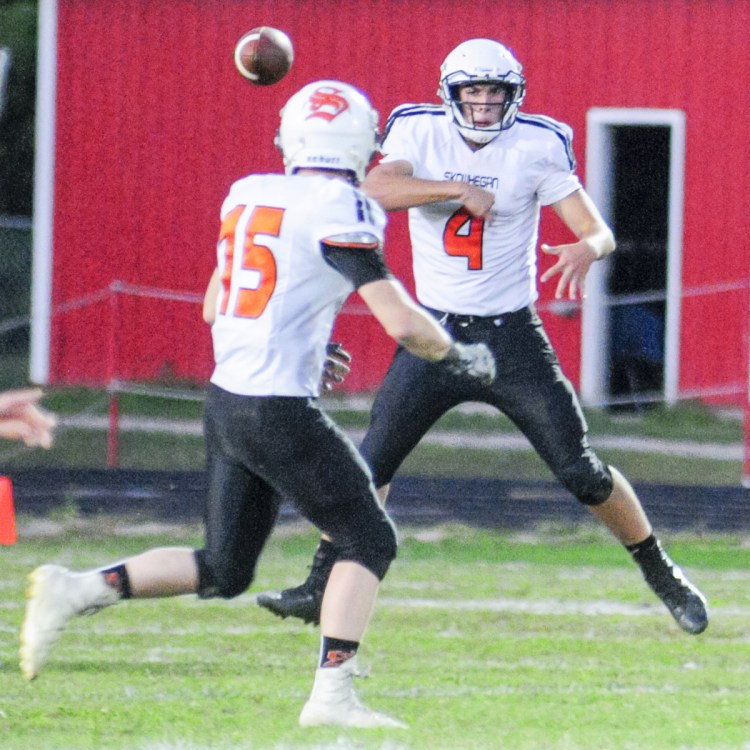 Skowhegan's Hunter Washburn, left, catches a pass from Marcus Christopher during a Pine Tree Conference game against Cony last season. Christopher is among the semifinalists for the Fitzpatrick Trophy, handed out to the top senior high school football player in the state.