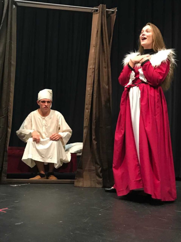 James Greenwood, left, as Ebeneezer Scrooge and Katie Daigle as the Ghost of Christmas Present.