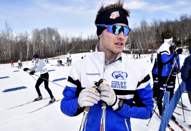 Colby College student and member of the Nordic team Zane Fields talks about conditions during the Quarry Road Opener in Waterville on Sunday.
