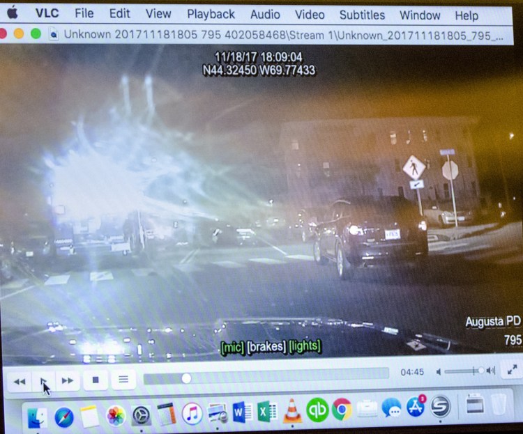 This image comes from video from an Augusta Police Department dashboard camera shown during opening statements Wednesday at Andrew Bilodeau's jury trial at the Capital Judicial Center in Augusta.