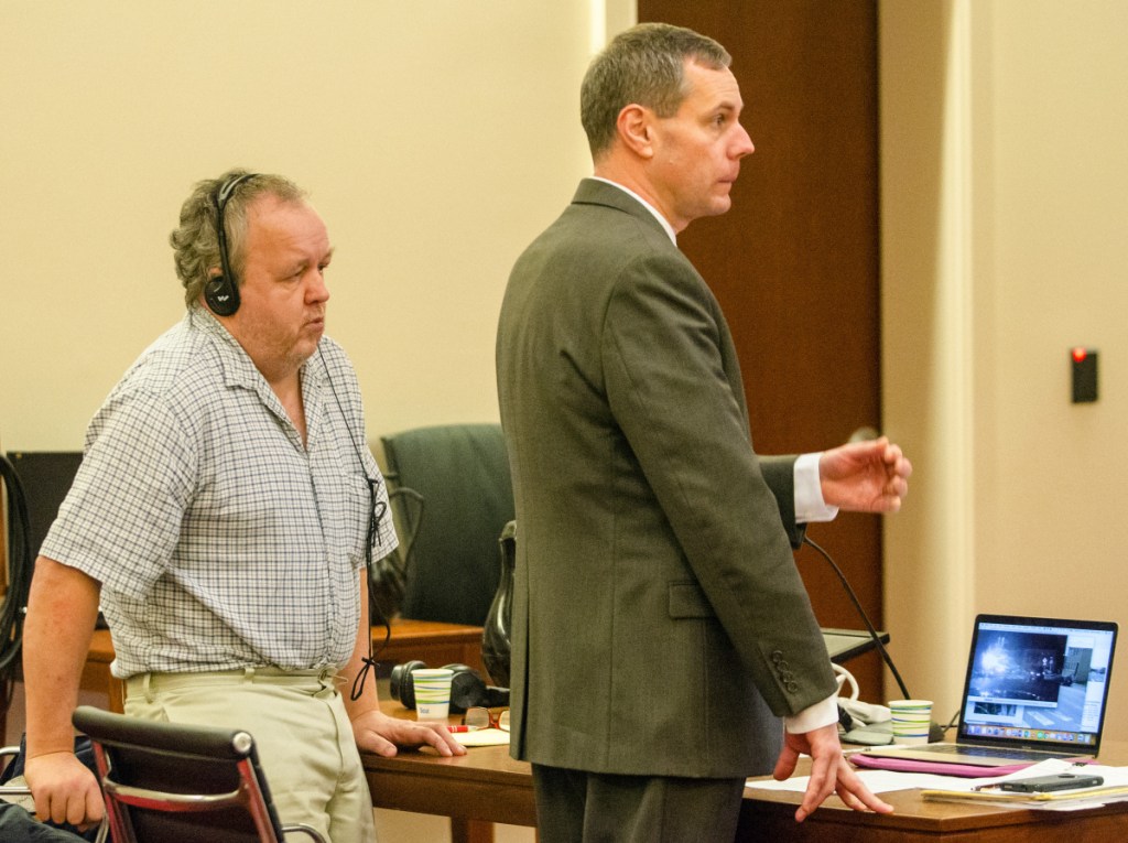 Andrew Bilodeau, left, watches as his attorney, Kevin Sullivan, participates in opening statements Wednesday during Bilodeau's jury trial at the Capital Judicial Center in Augusta.