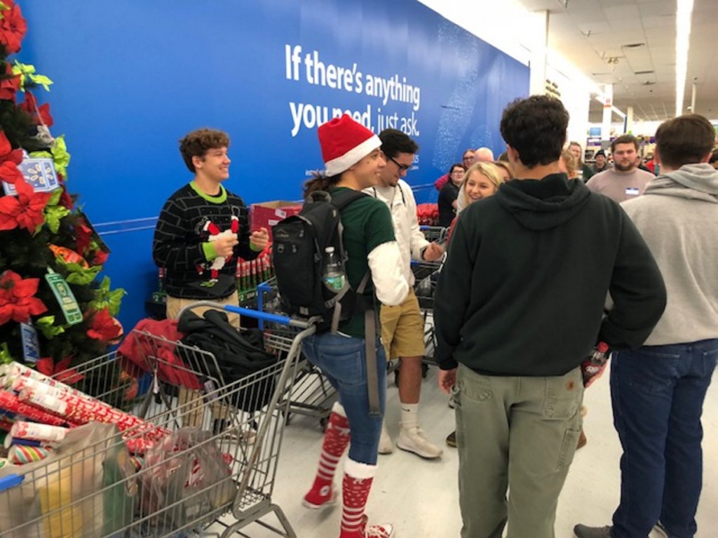 High school students from Carrabec, Skowhegan, Madison and Lawrence shopped for needy children Wednesday at Walmart with Jobs for Maine Graduates.