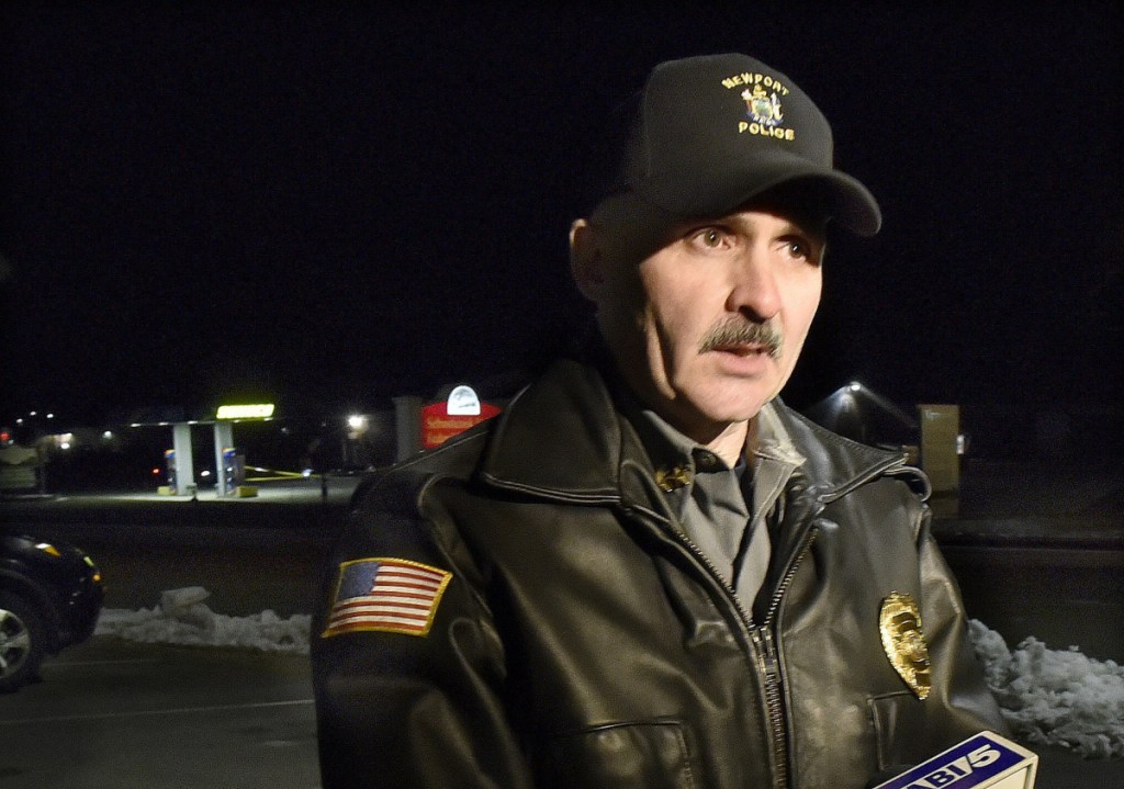 Newport police chief Leonard Macdaid speaks across the street from Bear's One Stop store in Newport after a shooting Wednesday evening.