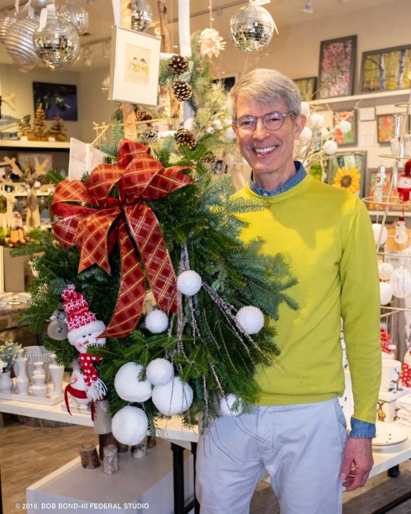 BIRCH Home Furnishings and Gifts co-owner Greg Uthoff shows off the wreath he designed and decorated as part of Wiscasset Holiday Marketfest's Wreaths Around the Holidays. The BIRCH wreath was chosen as the People's Choice winner at the close of Marketfest on Dec. 9.