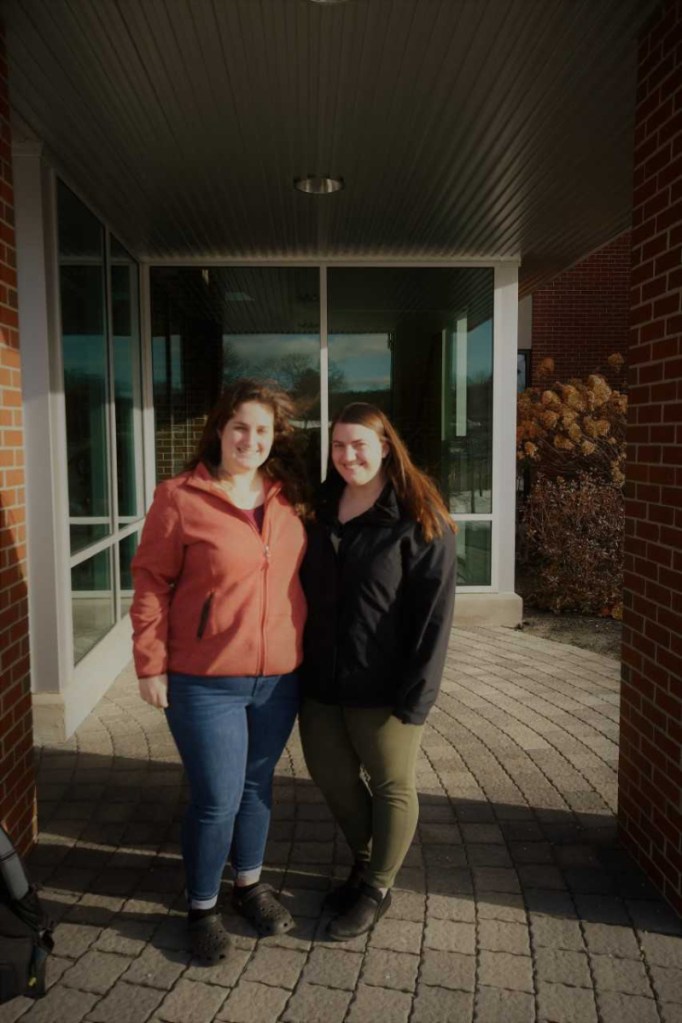 Thomas College students Annie Young, left, and Kaylee Marraffa recently were integral in securing an ecomaine School Recycling Grant program.