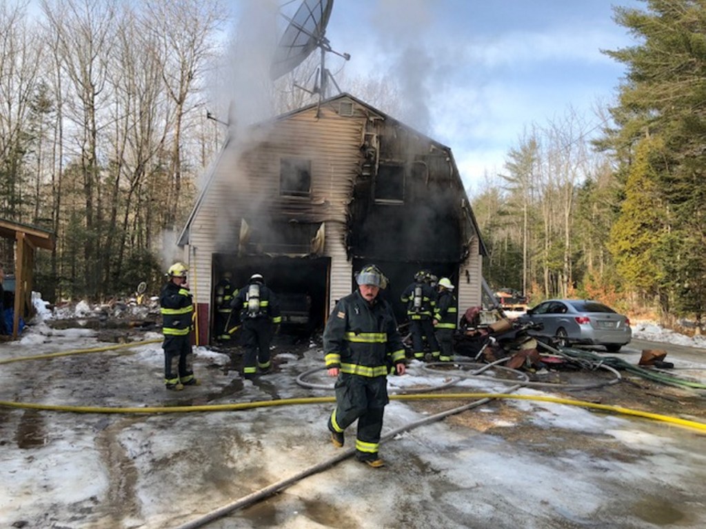 Fire crews from Norridgewock and Skowhegan battled a smoky fire in a garage Monday morning on Airport Road in Norridgewock. Fifty years worth of tools may have been lost in the blaze.