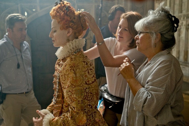 Margot Robbie, left, is seen with hair and makeup designer Jenny Shircore, right, on the set of "Mary Queen of Scots."