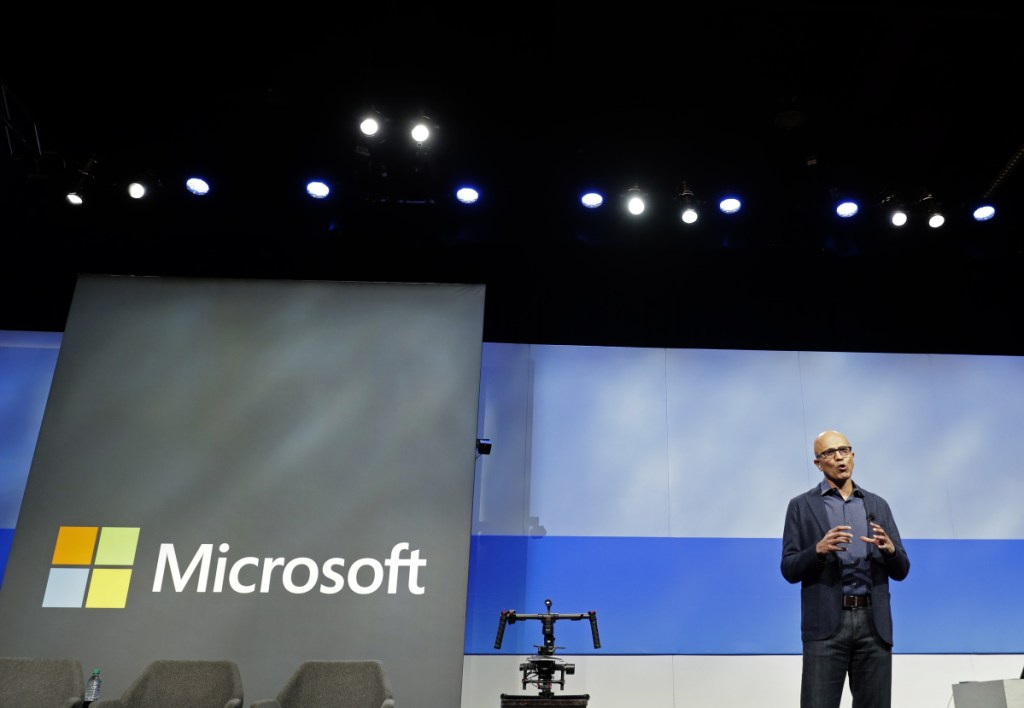Associated Press/Ted S. Warren
Microsoft CEO Satya Nadella speaks during the annual Microsoft Corp. shareholders meeting Friday in Bellevue, Wash. Microsoft surpassed Apple as the world's most valuable publicly traded company. Under Nadella Microsoft has found stability by moving away from its flagship Windows operating system and focusing on cloud-computing services with long-term business contracts.