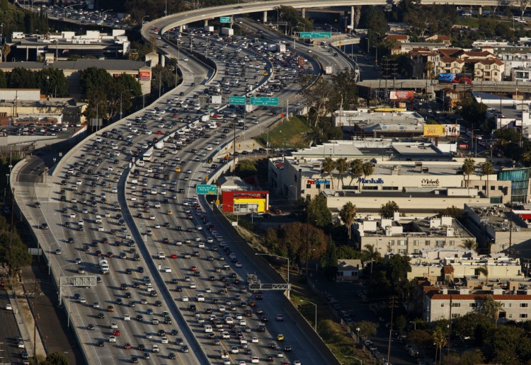 Vehicles clog the Interstate 405 freeway in Los Angeles in 2015. President Trump and Democrats want to pursue major public-works legislation in 2019, but there's no consensus on how to pay for it.