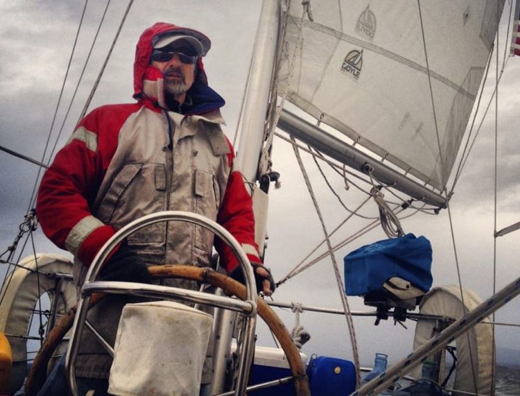 Capt. Rick Smith stands at the helm of his sailboat, Cimarron. Smith, who charters in Camden and the U.S. Virgin Islands, has been charged in connection with the death of a crew member aboard the boat in 2015. An initial Coast Guard investigative report of the incident said Smith and others aboard the vessel "tried to handle the sailor's apparent break the best they could."