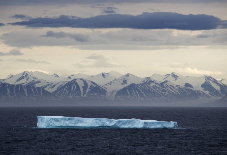 An iceberg in the Canadian Arctic Archipelago in July 2017. A National Oceanic and Atmospheric Administration report finds record low winter sea ice the Arctic and increased toxic algal blooms.