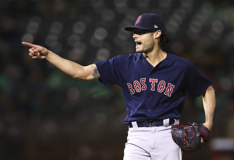 Joe Kelly was 4-2 with a 4.39 ERA and two saves in 73 games this year for the World Series champion Boston Red Sox. (AP Photo/Ben Margot)