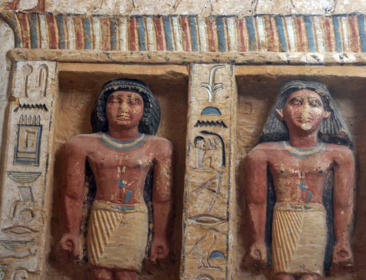 Relief statues decorate the walls of the tomb of a high official who served during the reign of King Nefer Ir-Ka-Re, about 4,400 years ago, near the Step Pyramid of Saqqara, in Giza, Egypt, on Saturday.