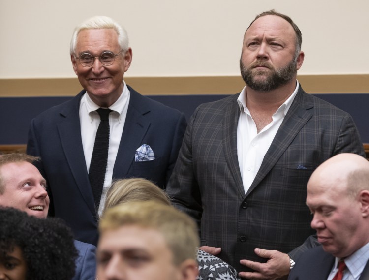 Trump confidant Roger Stone, left, has admitted that he spread false information on the website Infowars, founded by conspiracy theorist Alex Jones, right.