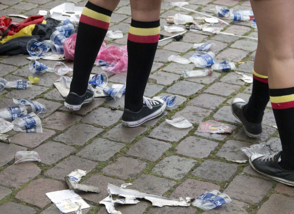 The plastic cups on this Belgian pavement wouldn't be affected by the European Union's proposed ban, but bags and other debris would be phased out.