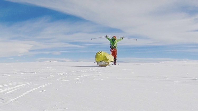 In this photo provided by Colin O'Brady, of Portland., Ore., he poses for a photo while traveling across Antarctica on Wednesday, Dec. 26, 2018. He has become the first person to traverse Antarctica alone without any assistance. O'Brady finished the 932-mile (1,500-kilometer) journey across the continent in 54 days, lugging his supplies on a sled as he skied in bone-chilling temperatures.
