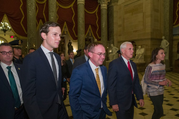 From left, White House senior adviser Jared Kushner, incoming White House Chief of Staff Mick Mulvaney and Vice President Mike Pence leave meetings to try to persuade senators to pass a bill that would pay for President Trump's border wall and avert a partial government shutdown, on Capitol Hill on Friday.