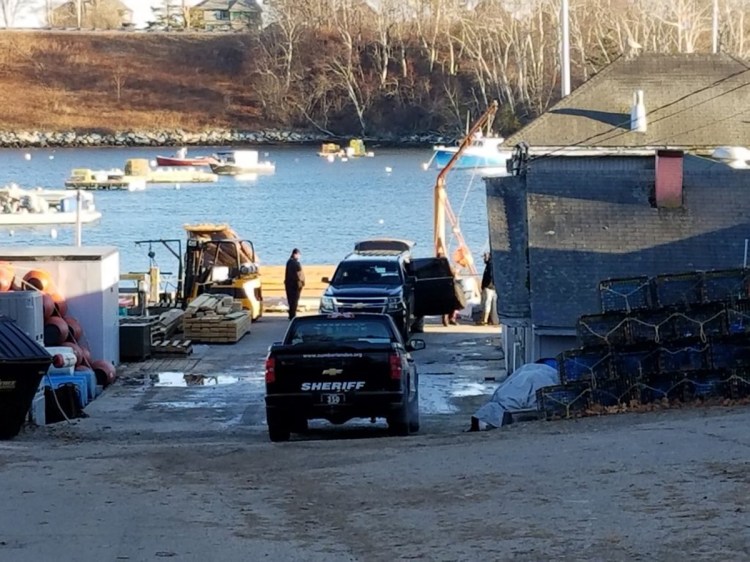 Police arrive at Bailey Island Lobster Company, after a projectile labeled “live round” was brought in from a lobster boat. 
