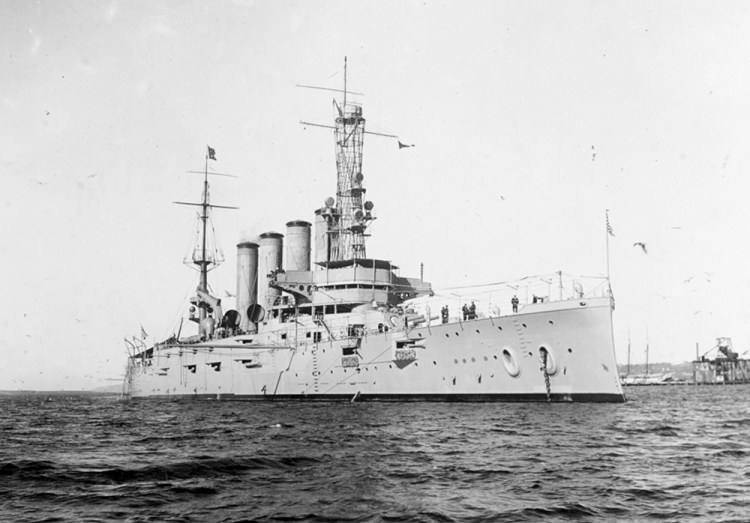 This Jan. 28, 1915 made available by the U.S. Naval History and Heritage Command shows the USS San Diego while serving as flagship of the Pacific Fleet. Her name had been changed from California in September 1914. On a clear summer day, July 19, 1918, an external explosion near the ship’s engine room shook the armored cruiser. Water soon rushed into the hull. Within minutes, the 500-foot warship began to capsize. Weighed down with 2,900 tons coal for a planned voyage across the Atlantic Ocean, the vessel sank in just 20 minutes. Six crew members perished. (U.S. Naval History and Heritage Command via AP)