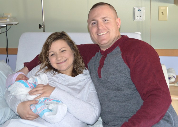 New baby Bristol rests with mom Larissa and dad Jason on Tuesday at Franklin Memorial Hospital in Farmington. The little girl was the first baby born in central Maine in 2019.